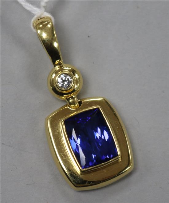 An 18ct gold, tanzanite and diamond drop pendant, overall 41mm.